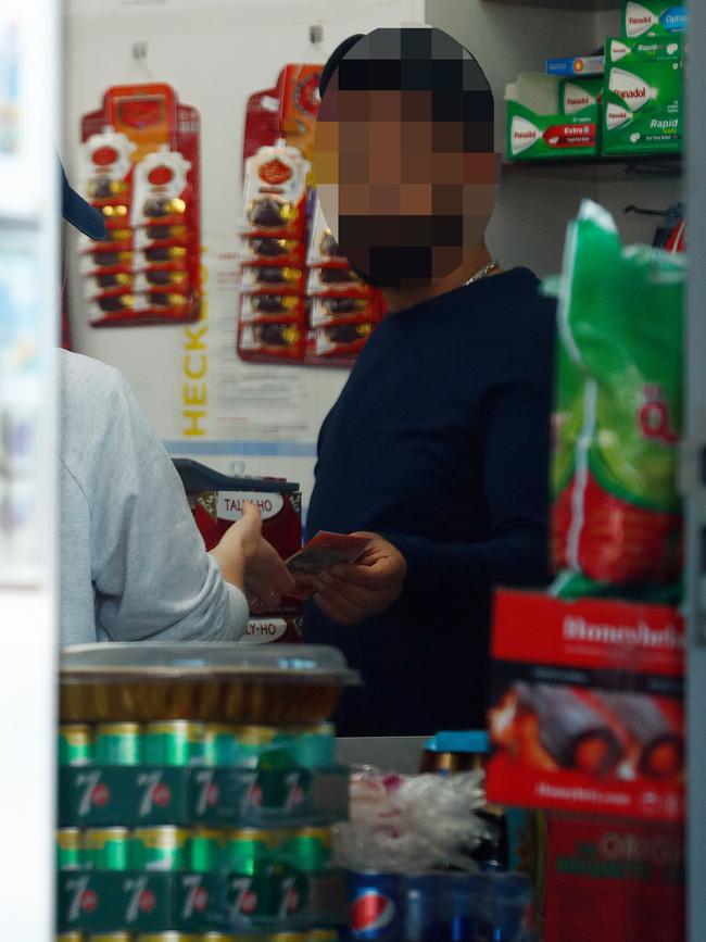 A shop attendant at a supermarket in Smithfield sells a Sunday Telegraph journalist a packet of illicit cigarettes. Picture: Sam Ruttyn