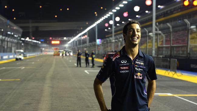 Red Bull Racing driver Daniel Ricciardo on the main straight of the Marina Bay street circuit during preparations for the Singapore Grand Prix