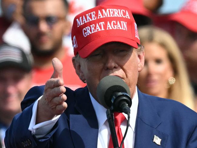 Former US President and Republican presidential candidate Donald Trump speaks at a campaign event in Racine, Wisconsin, on June 18, 2024. (Photo by Jim WATSON / AFP)