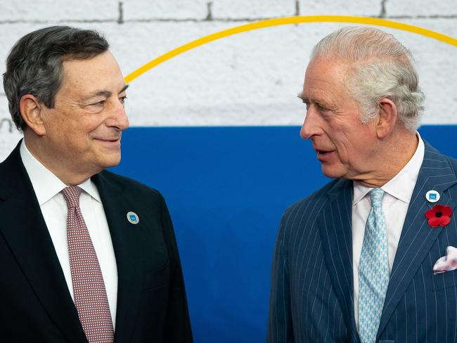 Prince Charles is greeted by Italian Prime Minister Mario Draghi as he arrives to attend the G20 Summit at the La Nuvola conference centre. Picture: AFP