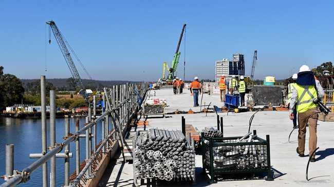 ALMOST THERE: The final segment of the new Grafton bridge has been lifted into place signalling the final stages of its construction. Picture: Jenna Thompson