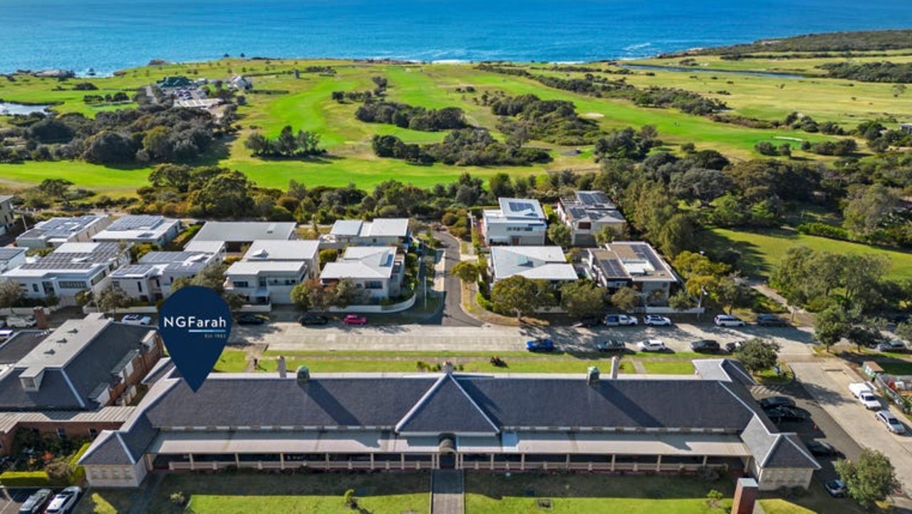 Little Bay is surrounded by green space, trees and ocean.