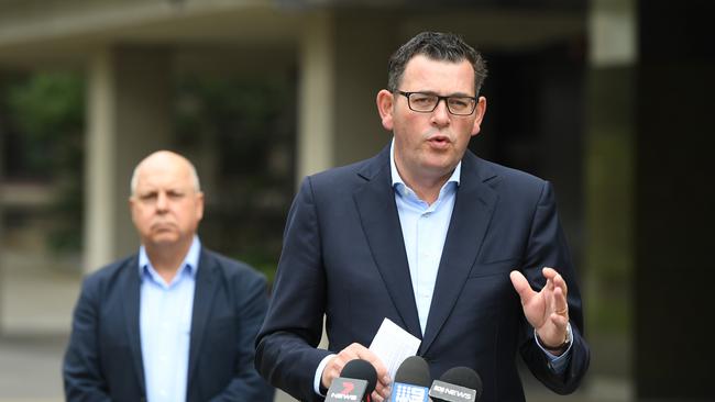 Victorian Premier Daniel Andrews and Victorian Treasurer Tim Pallas speak to the media on Saturday.