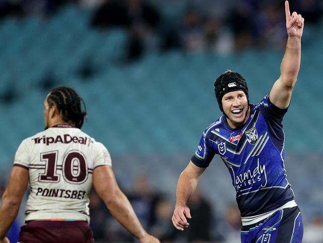 SYDNEY, AUSTRALIA - SEPTEMBER 02: Matt Burton of the Bulldogs kicks a field goal in the final minutes of the game during the round 25 NRL match between the Canterbury Bulldogs and the Manly Sea Eagles at Accor Stadium, on September 02, 2022, in Sydney, Australia. (Photo by Brendon Thorne/Getty Images)