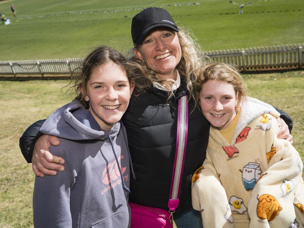 Getting behind Downlands are (from left) Ruby, Inicka and Sienna Lindenmayer on Grammar Downlands Day at Toowoomba Grammar School, Saturday, August 19, 2023. Picture: Kevin Farmer