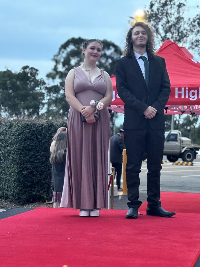 The students of Urangan State High School arriving at their formal.