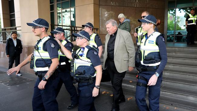 George Pell leaves the Melbourne Magistrates’ Court under Police protection last week. Picture: Stuart McEvoy/The Australian.