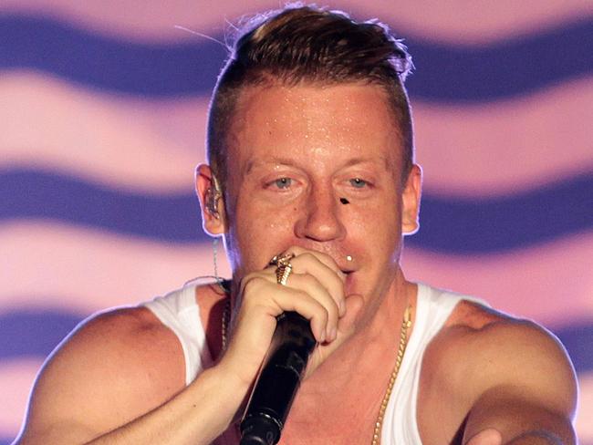 US rapper Macklemore vowed to "go harder" when he plays his gay anthem Same Love on Sunday. Picture: AFP