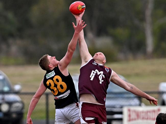 Bacchus MarshÃs Joel Freeman and MeltonÃs Brett Mcintyre during the BFL football match between Melton and Bacchus Marsh in Toolern Vale, Saturday, July 9, 2022. Picture: Andy Brownbill