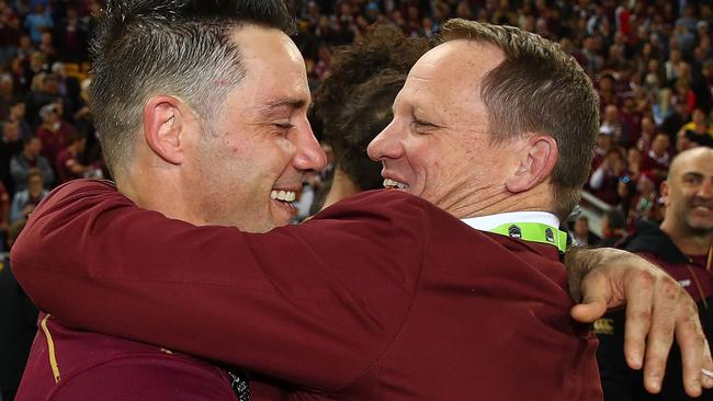 Cooper Cronk of the Maroons hugs coach Kevin Walters.