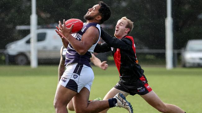 RDFL: Melton Centrals’ Samuel Apineru takes a mark. Picture: George Sal