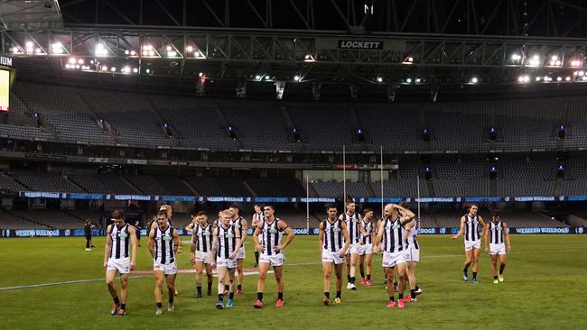 The Magpies leave an empty Marvel Stadium. Picture: AAP Images