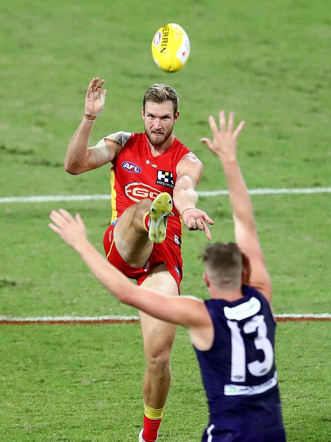 Sam Day of the Suns attempts a goal during the round 4 AFL match between the Gold Coast Suns and Fremantle Dockers at Metricon Stadium on June 27, 2020 in Gold Coast, Australia. (Photo by Jono Searle/AFL Photos/via Getty Images )