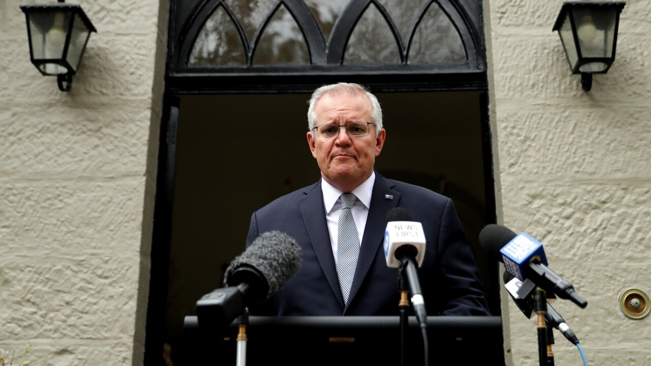 Morrison distances federal government from responsibility for RATs shortage