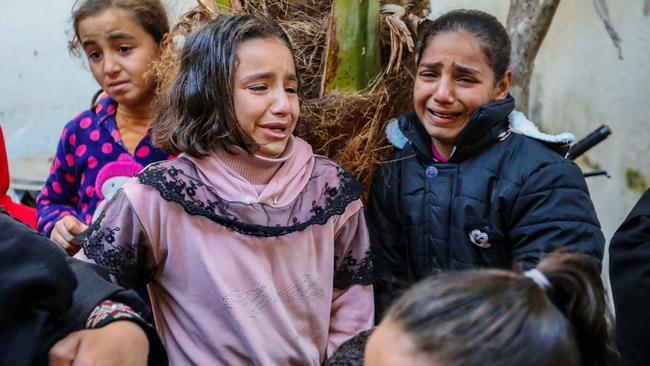 Children mourn the death of relatives after Israeli air strikes in Rafah. Picture: Getty Images