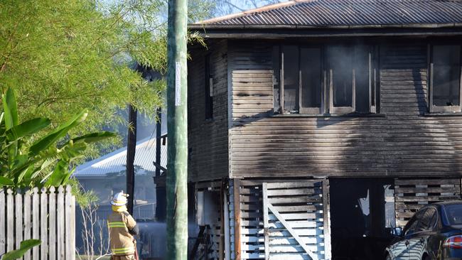 House destroyed in Garbutt with two men taken to hospital with life-threatening injuries.