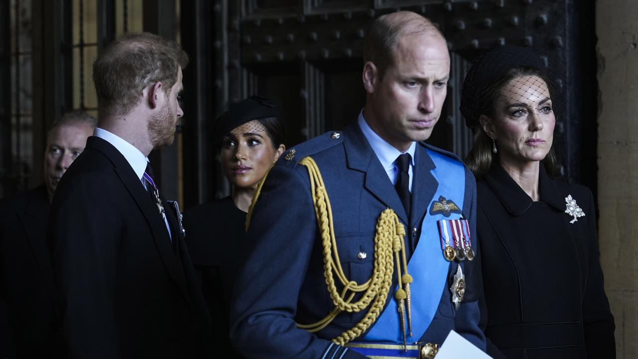 Prince William, Prince of Wales, Catherine, Princess of Wales, Prince Harry, Duke of Sussex, and Meghan, Duchess of Sussex, leave after escorting the coffin of Queen Elizabeth II to Westminster Hall (Photo by Emilio Morenatti - WPA Pool/Getty Images)