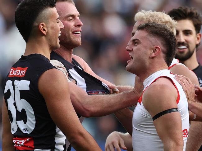 MELBOURNE. 07/05/2023. AFl. Round 8. Collingwood vs. Sydney at the MCG. Players punch on after Swans players got stuck into Nick Daicos of the Magpies after a Sydneys Ryan Clarke 1st qtr goal . Pic: Michael Klein