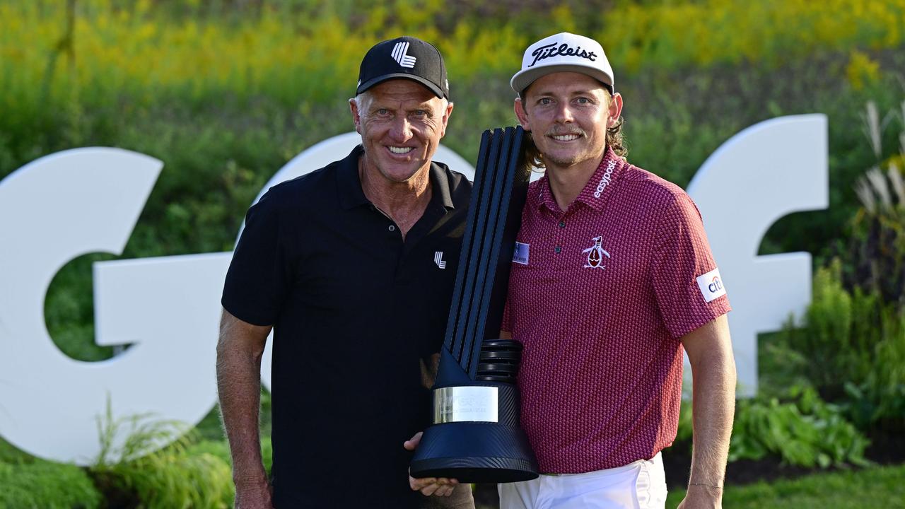 SUGAR GROVE, ILLINOIS – SEPTEMBER 18: Team Captain Cameron Smith of Punch GC poses with Greg Norman, CEO and commissioner of LIV Golf, after winning the individual title during Day Three of the LIV Golf Invitational – Chicago at Rich Harvest Farms on September 18, 2022 in Sugar Grove, Illinois. Quinn Harris/Getty Images/AFP