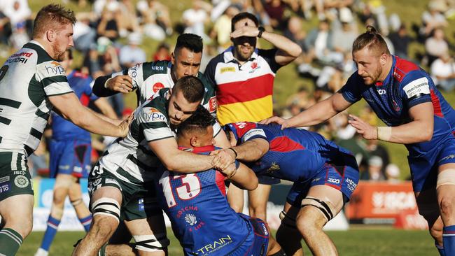 Action in last year’s Battle of the Beaches won 28-23 by Warringah. Pic: Karen Watson