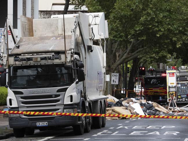 The contents of a garbage truck caught fire due to a chemical reaction outside the fire station on Coward St in Mascot, Sydney. Picture: Simon Bullard.