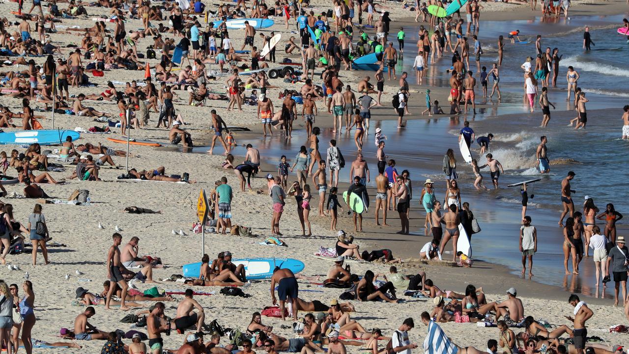 There was very little social distancing on Friday at Bondi Beach. Picture: Jonathan Ng