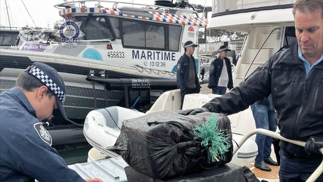 Police on-board the Sea Ray Cruiser that allegedly contained over 1.1 tonnes of cocaine.