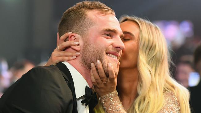 Tom Mitchell gets a kiss from girlfriend Hannah Davis. Picture: Getty Images