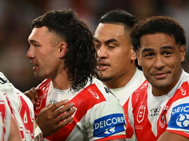 BRISBANE, AUSTRALIA - JULY 13: Dragons celebrate a Jaydn Su'A try during the round 19 NRL match between Brisbane Broncos and St George Illawarra Dragons at Suncorp Stadium, on July 13, 2024, in Brisbane, Australia. (Photo by Albert Perez/Getty Images)