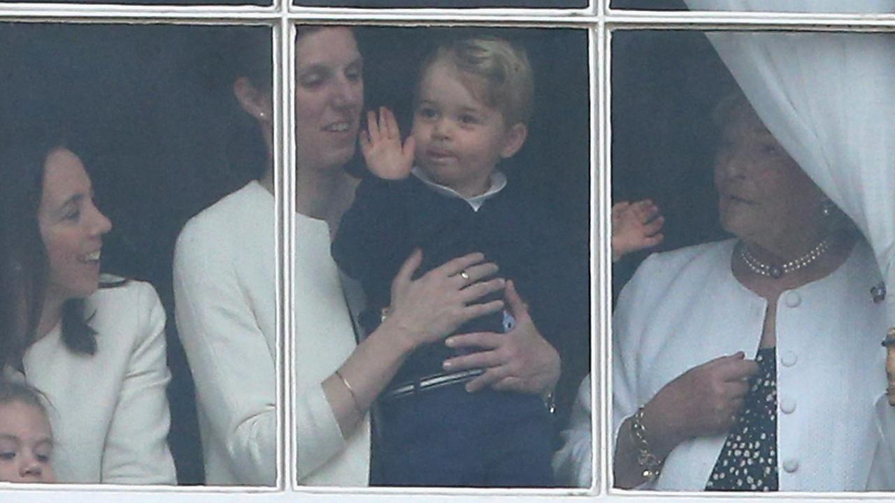 Prince George was famously snapped waving as he was held by Ms Borrallo at Buckingham Palace as he watched the Trooping the Colour in 2015. Picture: Chris Jackson/Getty Images