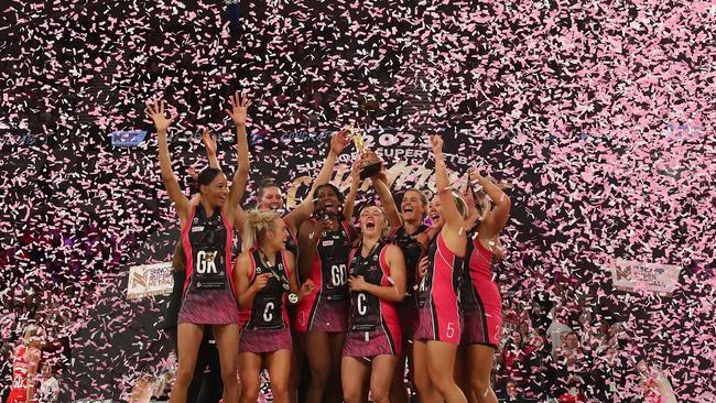 Thunderbirds celebrate their Super Netball victory with the trophy. Picture: Getty