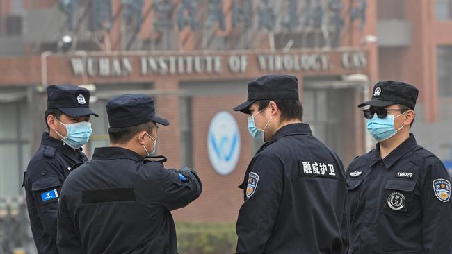 Security guards outside the Wuhan Institute of Virology in China. Picture: AFP