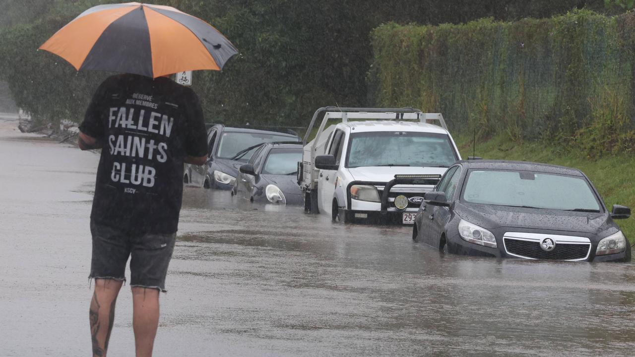 Gold Coast suffers in the aftermath from ex Cyclone Alfred, as it still hits the coast with strong winds and rain. Siganto Dve at Oxenford claims a few more cars. Picture Glenn Hampson