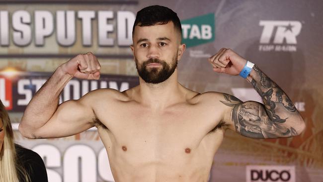 Terry Nickolas makes weight during the weigh-in for the World Lightweight Championship bout between George Kambosos and Devin Haney at Margaret Court Arena in June 2022. A fortnight later he was arrested. Picture: Darrian Traynor.