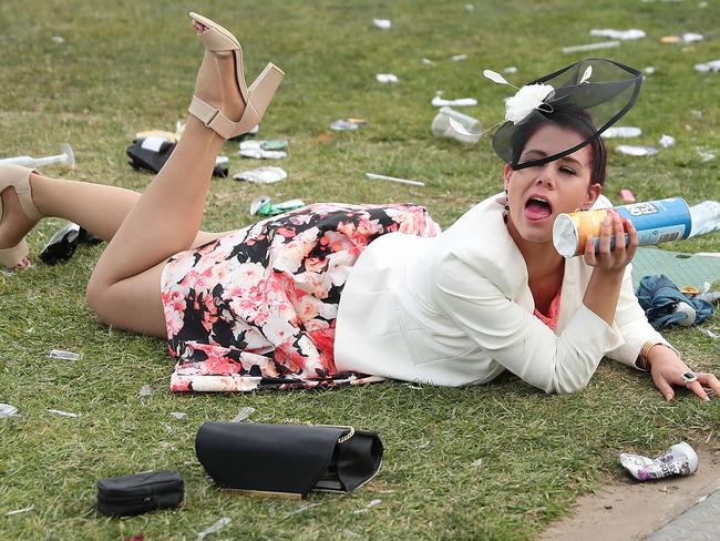 A racegoers falls over following 2016 Melbourne Cup Day. Picture: Scott Barbour/Getty Images