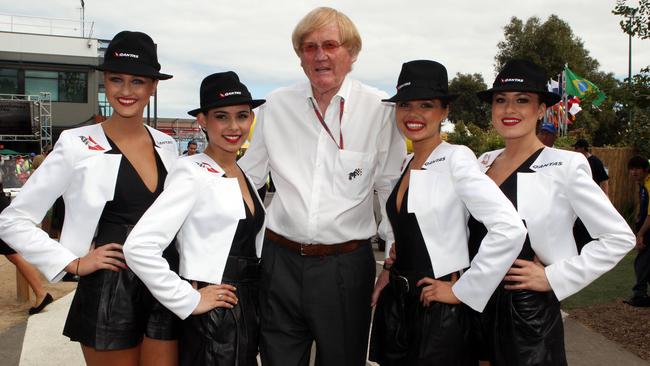 Ron celebrating with The Qantas grid girls at the Australian Grand Prix.