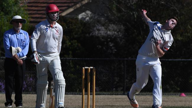 Hugh Birchall bends his back on day one. Picture: James Ross/AAP