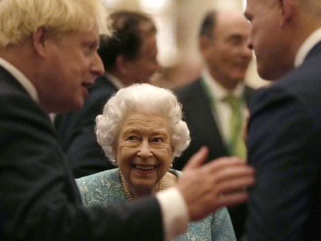 Queen Elizabeth II and UK Prime Minister, Boris Johnson greet guests during a reception for international business and investment leaders at Windsor Castle last year. Picture: Getty Images