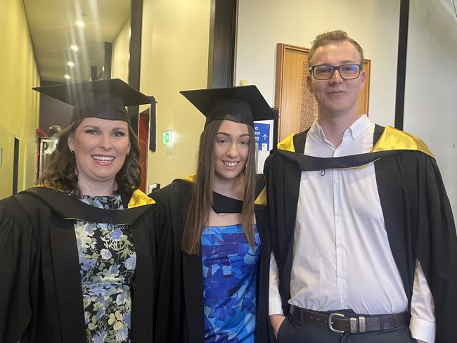 Graduates from the University of the Sunshine Coast's Fraser Coast campus celebrating at the Brolga Theatre.