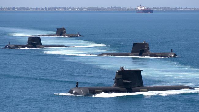 Four of the Collins-class submarines in formation in Western Australia. They provide a strategic advantage in surveillance and protection of Australia’s maritime approaches that will have to last until the Attack class is introduced, starting in the 2030s. Picture: ADF