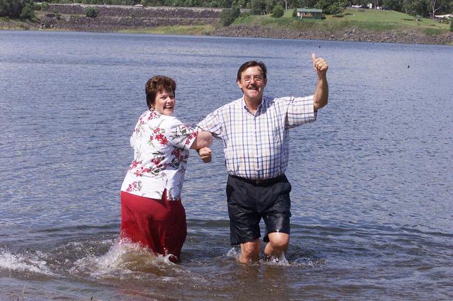 Gold Coast Mayor Gary Baildon and Cr Daphne McDonald doing a jig in the Hinze Dam after the levels rose