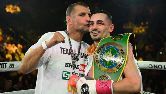 Nader Hamdan with his son, Hass, who wan an Australian title on the Gold Coast last month. Picture: Matt Roberts/mattrimages.com.au/No Limit Boxing