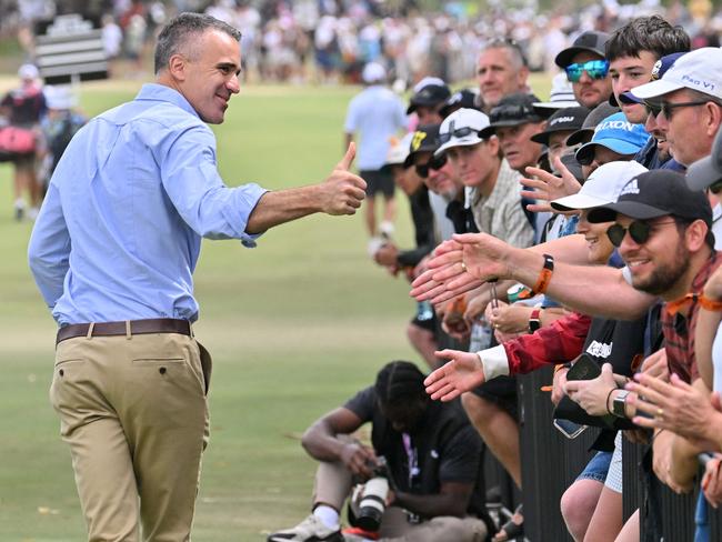 South Australia's Premier Peter Malinauskas greets spectators after securing the tournament until 2031 during the final day of the LIV Golf Adelaide at the Grange Golf Club in Adelaide on February 16, 2025. (Photo by Brenton Edwards / AFP) / -- IMAGE RESTRICTED TO EDITORIAL USE - STRICTLY NO COMMERCIAL USE --