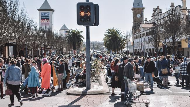 Festival goers line the streets of Warwick to check out the many different artesian markets on offer during Jumpers &amp; Jazz in July.