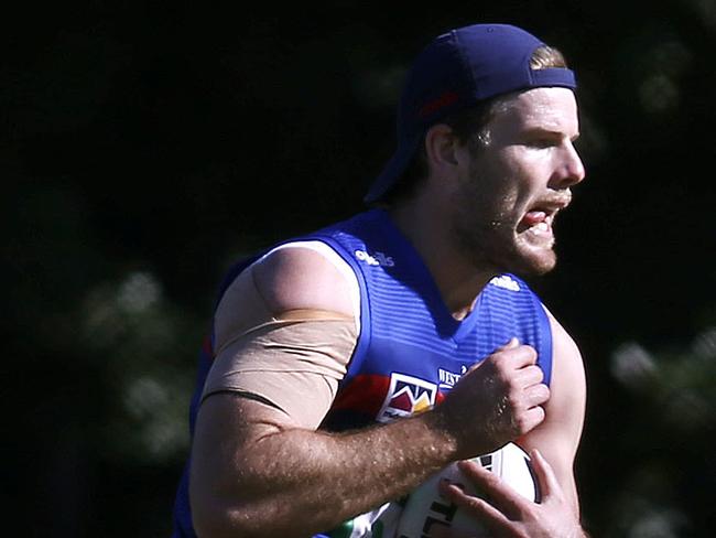 Lachlan Fitzgibbon  runs the ball during an NRL Newcastle Knights training session at Balance Field, in Mayfield, Tuesday, May 12, 2020. (AAP Image/Darren Pateman) NO ARCHIVING