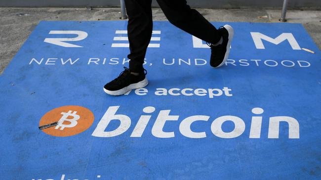 A bitcoin banner at the Bitcoin 2021 Convention in Florida. Picture: AFP