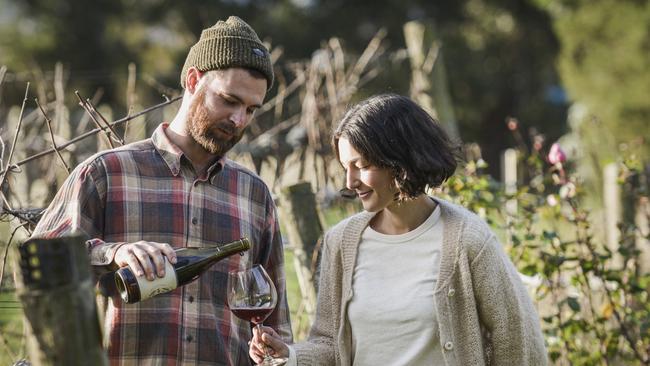 Good life: Adriana D’Amico and Al Johnson on their vineyard, Bandicoot Run at Longwarry. Picture: Dannika Bonser