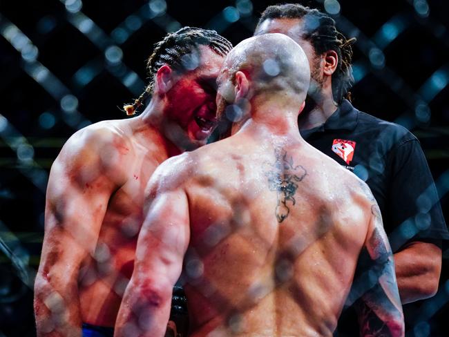 Alexander Volkanovski and Brian Ortega square up after the end of the second round. Picture: Alex Bierens de Haan/Getty