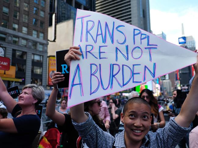 This photo taken on July 26, 2017 shows protesters against US President Donald Trump during a demonstration in front of the US Army career centre in Times Square, New York. Picture: AFP