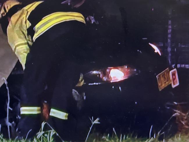 Witnesses said the sedan hit another car before smashing into the pole on Monday night. Picture: Channel 7